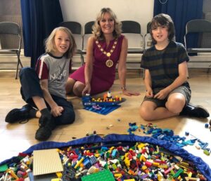 Deputy Mayor, Joy Allen enjoys the Lego Block Party with children in Bishop Auckland Town Hall
