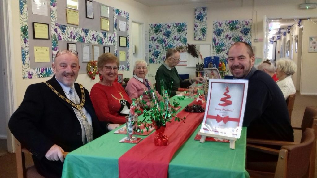 Mayor David Fleming, Monica Fleming and Councillor Lee Brownson enjoying Christmas Lunch at Durham Alliance for Community Care