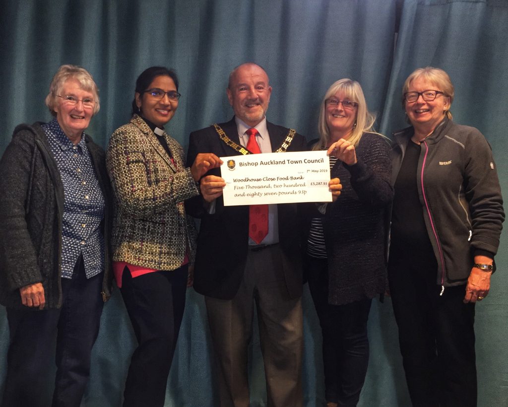 Mayor David Fleming presenting end of Mayoral year donation of £5287.93 to Woodhouse Close Community Foodbank