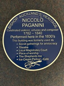 Close up of blue plaque, Zair's Cafe