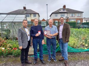The Mayor Cllr Sam Zair and Cllr Michael Siddle with the joint Winner of South Church.